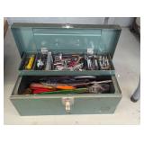 Green metal toolbox containing a la...