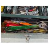 Green metal toolbox containing a la...