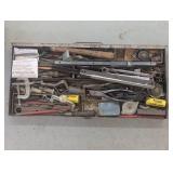 Metal storage drawer containing a l...