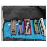 Roll up tool case with a variety of...