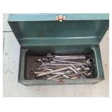 Green metal toolbox with a variety ...