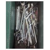 Green metal toolbox with a variety ...