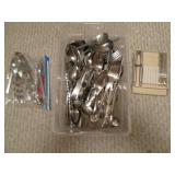 Assortment of silverware along with...