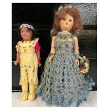 Two Vintage Home Inc Dolls Indian Girl and Girl with Flowers