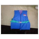 Lot of Adult and Youth Life Jackets and Inflatable Lounger