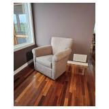 Toupe Tac Swivel Arm Chair