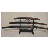 Trio of Decorative Chinese Swords with Wooden Display Rack
