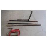 PICK, TWO HEAVY STEEL RODS, A STEEL L BRACKET, CLAMP