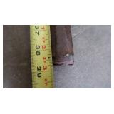 PICK, TWO HEAVY STEEL RODS, A STEEL L BRACKET, CLAMP