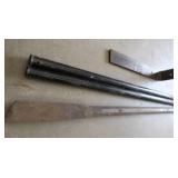PICK, TWO HEAVY STEEL RODS, A STEEL L BRACKET, CLAMP
