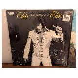 Four Elvis Presley Records