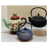 Three Teapots, Including Two Cast Iron