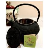 Three Teapots, Including Two Cast Iron