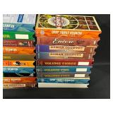 Collection of Trivial Pursuit Board Games and VHS Tapes