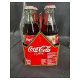 Collection of Vintage Coca-Cola and Pepsi-Cola Bottles