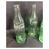 Collection of Vintage Coca-Cola and Pepsi-Cola Bottles