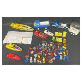 Vintage Toy Lot with Tonka Trucks, Racing Boats, and Assorted Figures