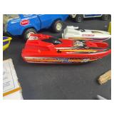 Vintage Toy Lot with Tonka Trucks, Racing Boats, and Assorted Figures