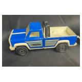 Vintage Toy Lot with Tonka Trucks, Racing Boats, and Assorted Figures