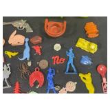 Vintage Toy Lot with Tonka Trucks, Racing Boats, and Assorted Figures