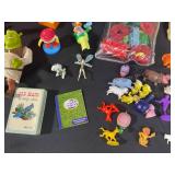 Lot of Assorted Toys and Figures - Zip Track, Lion King Bag, and More