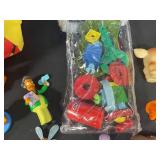 Lot of Assorted Toys and Figures - Zip Track, Lion King Bag, and More