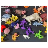 Lot of Assorted Toys and Figures - Zip Track, Lion King Bag, and More