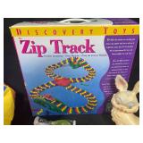 Lot of Assorted Toys and Figures - Zip Track, Lion King Bag, and More