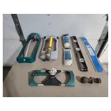 Lot of Various Sprinklers, Level, Rope and Other Garage Items