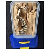 Lot of Assorted Wooden Blocks and Train Tracks in Storage Bins