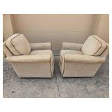 Pair of Beige Upholstered Swivel Chairs