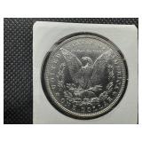 1886 Morgan Silver Dollar Marked MS65 When Purchased