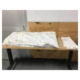 Pallet of pillows and blankets