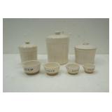 lidded ceramic cannister set with measuring cups
