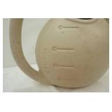 Watering container and other