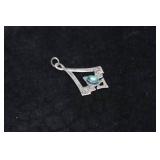 Silver Tone Pendant with Blue Stone