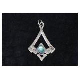 Silver Tone Pendant with Blue Stone