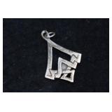 Silver Tone Pendant with Blue Stone