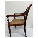Stunning Brown Wooden Antique Armchair Craved Back Cane Seat, Lots of Character!