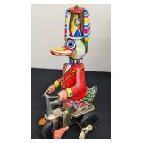 Pair of Vintage Tin Ducks on Bike Toys