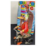 Pair of Vintage Tin Ducks on Bike Toys