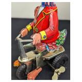 Pair of Vintage Tin Ducks on Bike Toys