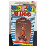 Pair of Vintage Tin Ducks on Bike Toys