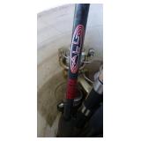 Bucket full of spinning reel fishing rods