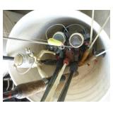 Bucket full of spinning reel fishing rods