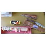 1 filet and 1 hunting knife plus a bunch of fishing hooks