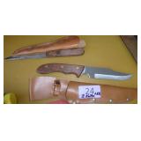 1 filet and 1 hunting knife plus a bunch of fishing hooks