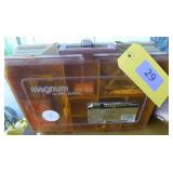 Plano tackle box full of fishing lures and worms