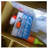 Plano tackle box full of fishing lures and worms