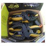 Large group of clamps (at least 12)  and 2 Adjustable clamps